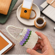 Handmade crochet mini bag with handle, cream and purple design, boho-style accessory, small crochet purse, DIY gift idea for women.