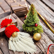 Handmade macrame gnome ornament with a red hat, boho Christmas decor, cute Scandinavian-inspired holiday decoration, DIY gift idea.