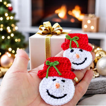 Handmade crochet snowman ornaments with red hats, cute Christmas decor, winter holiday decorations, DIY snowman amigurumi pattern.