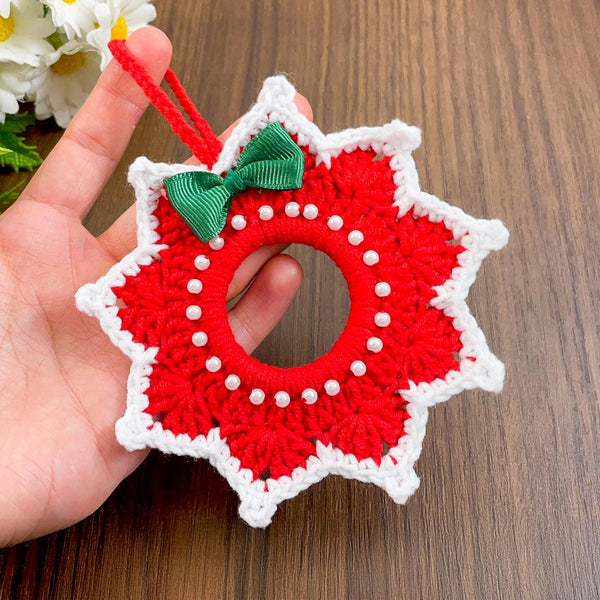Handmade red and white crochet Christmas ornament, pearl-accented wreath decoration for wall or tree