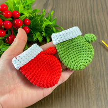 Handmade red crochet mini Christmas mitten, perfect for holiday decoration, Christmas tree ornament, gift tag, and home decor.