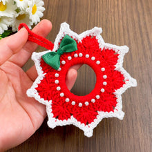 Handmade red and white crochet Christmas ornament, pearl-accented wreath decoration for wall or tree